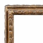 Cornice barocca in legno intagliato e dorato. Lombardia, XVII secolo.